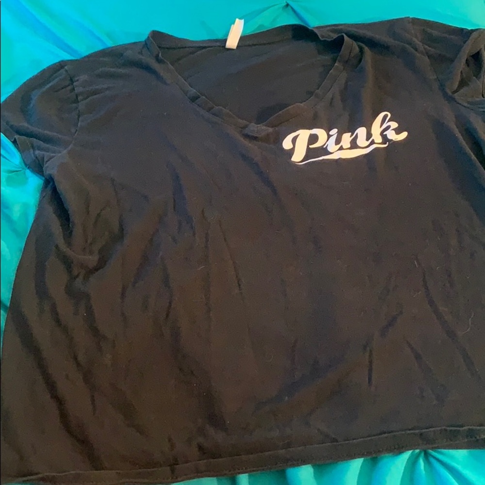a pink top